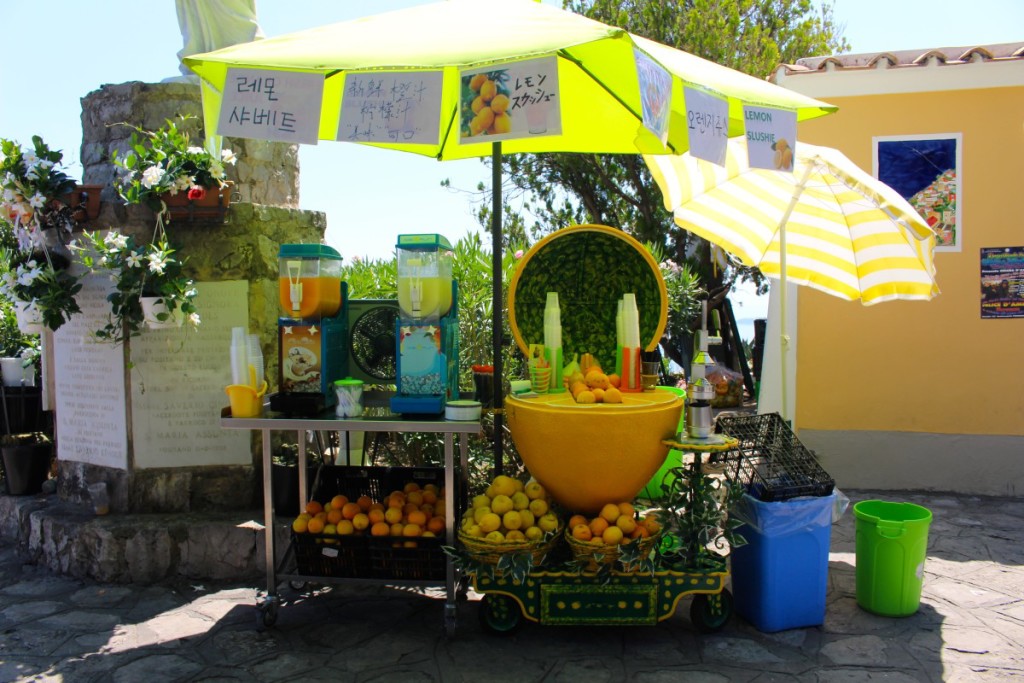 A melon and lemon granita stand on the side of the road in Amalfi