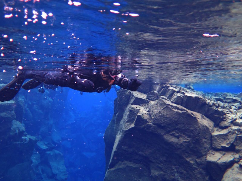 Snorkeling in the Silfra Fissure in Iceland is an absolute must do! #snorkeling #Iceland