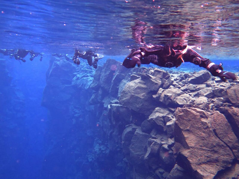 Snorkeling in the Silfra Fissure in Iceland is an absolute must do! #snorkeling #Iceland