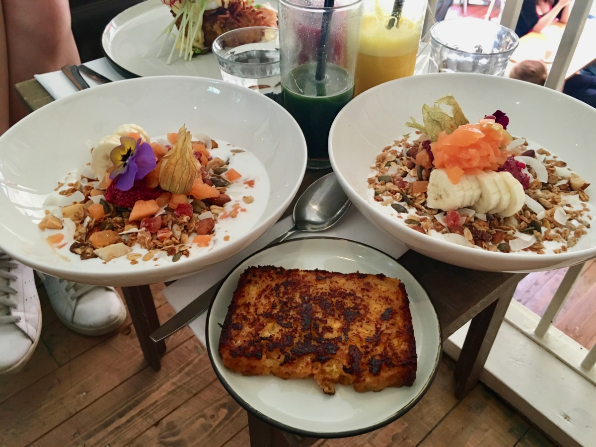 Vegan coconut milk yogurt bowls with homemade granola and their famous cornbread at Dignita, Amsterdam