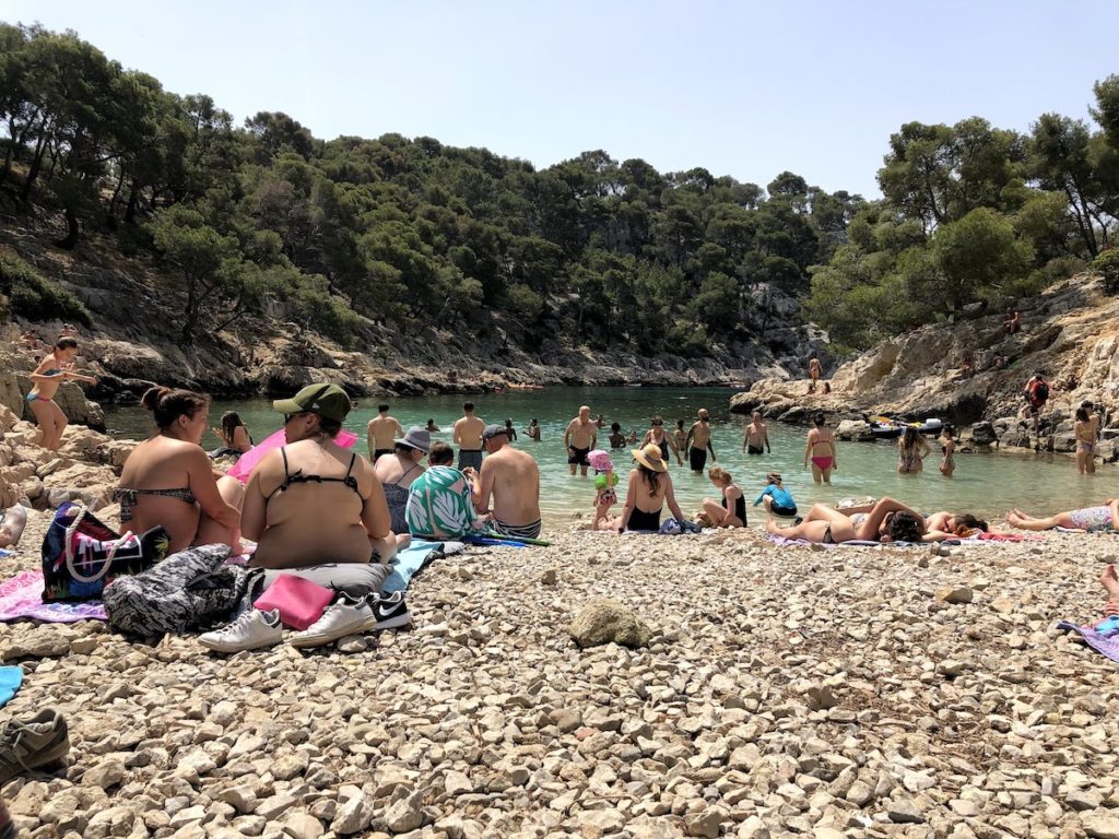 Beachgoers at Calanque Port Pin, Cassis, France