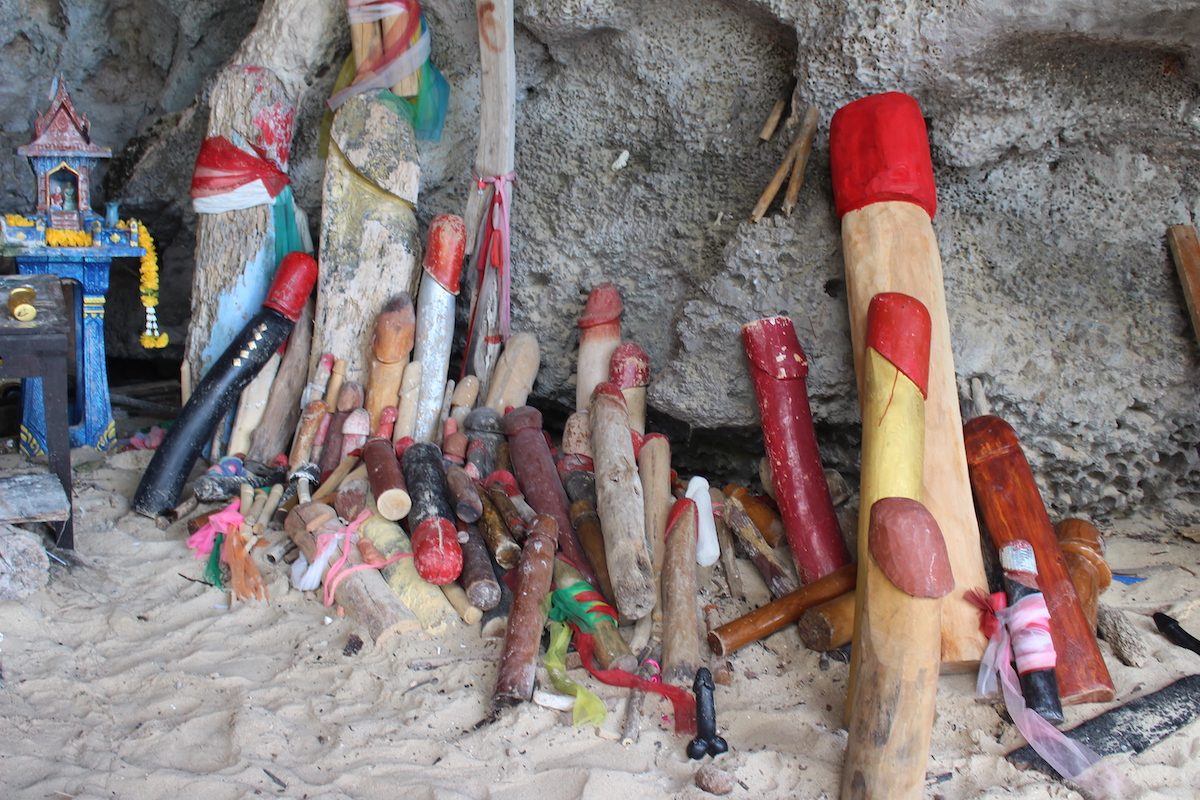 A selection of phallic items displayed at the Princess cave in Railay Beach, Thailand