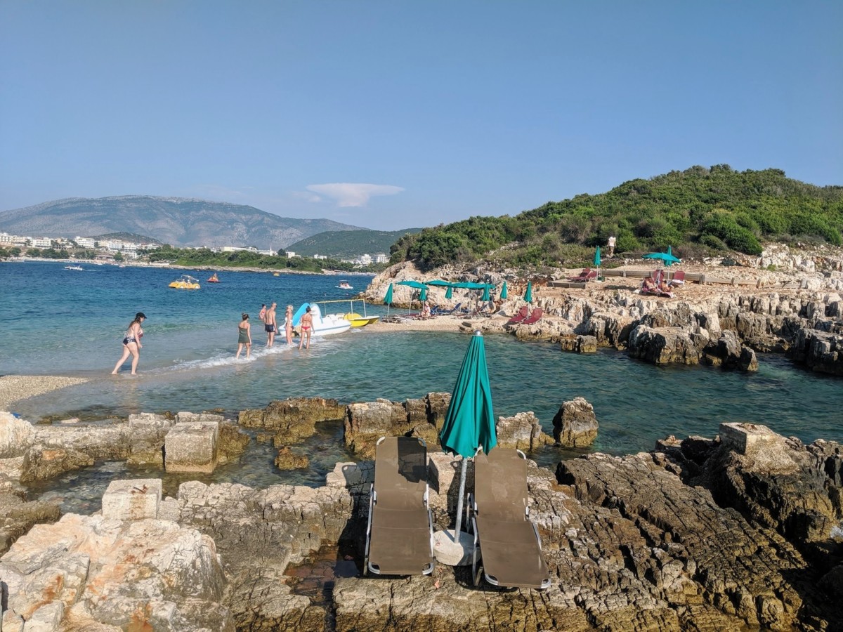 The girls walking from one of the Ksamil Islands to the other over a tiny strip of sand