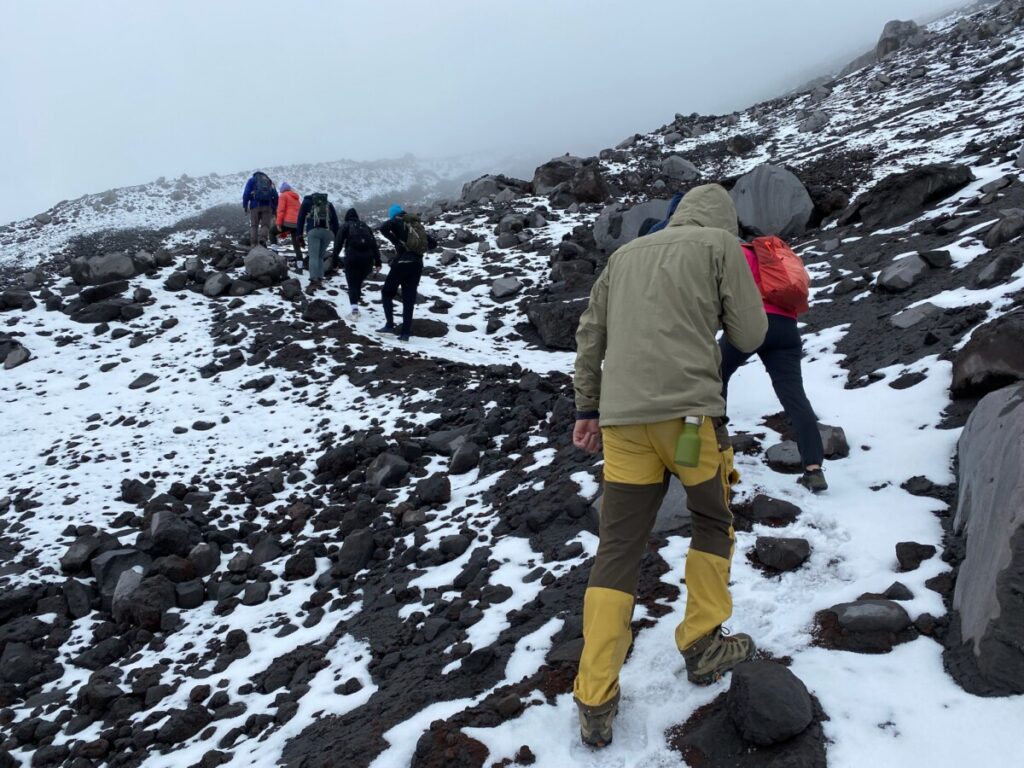 Hiking up in the hail to Cotopaxi glacier 
