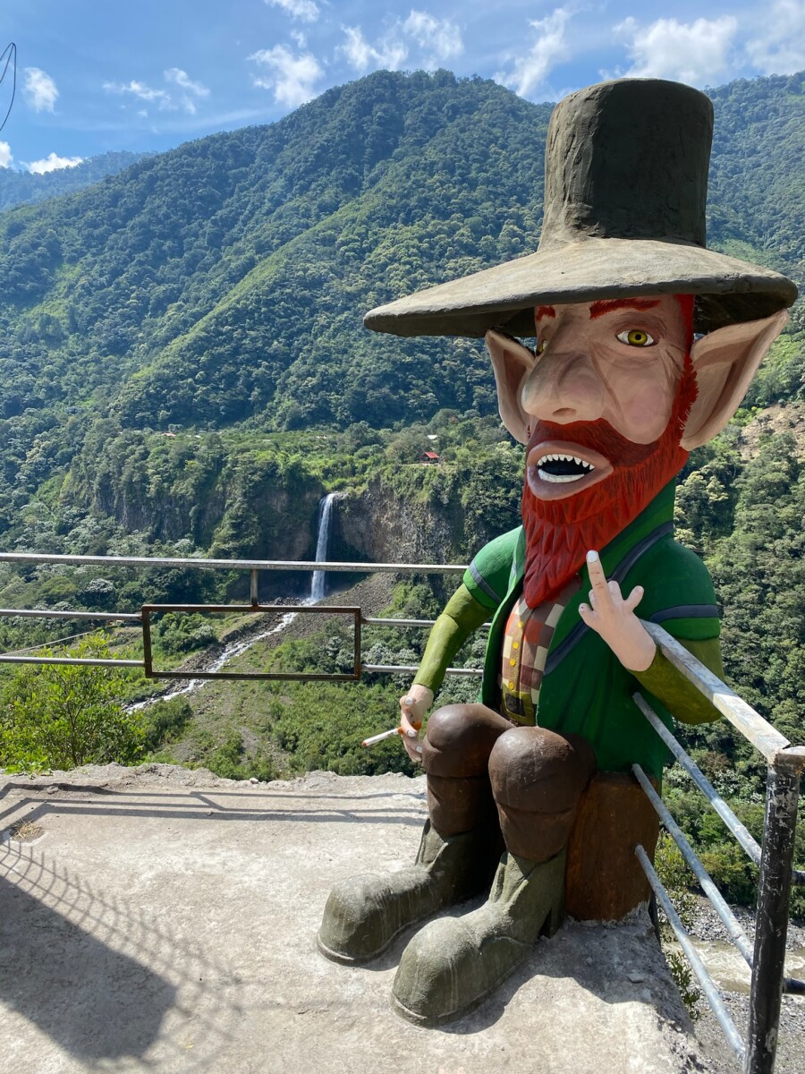 A larger than life size leprechaun statue on la ruta de las cascadas, Baños