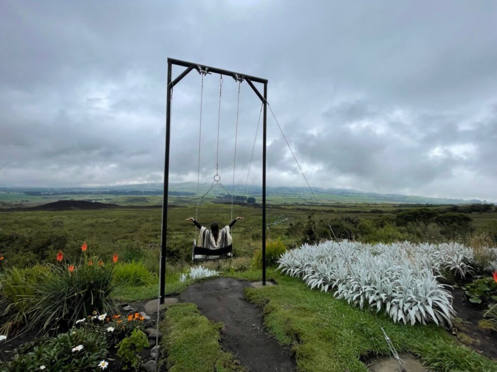 The famous Secret Garden Cotopaxi swing. I'm sitting on it looking out into the mountains, sky is overcast