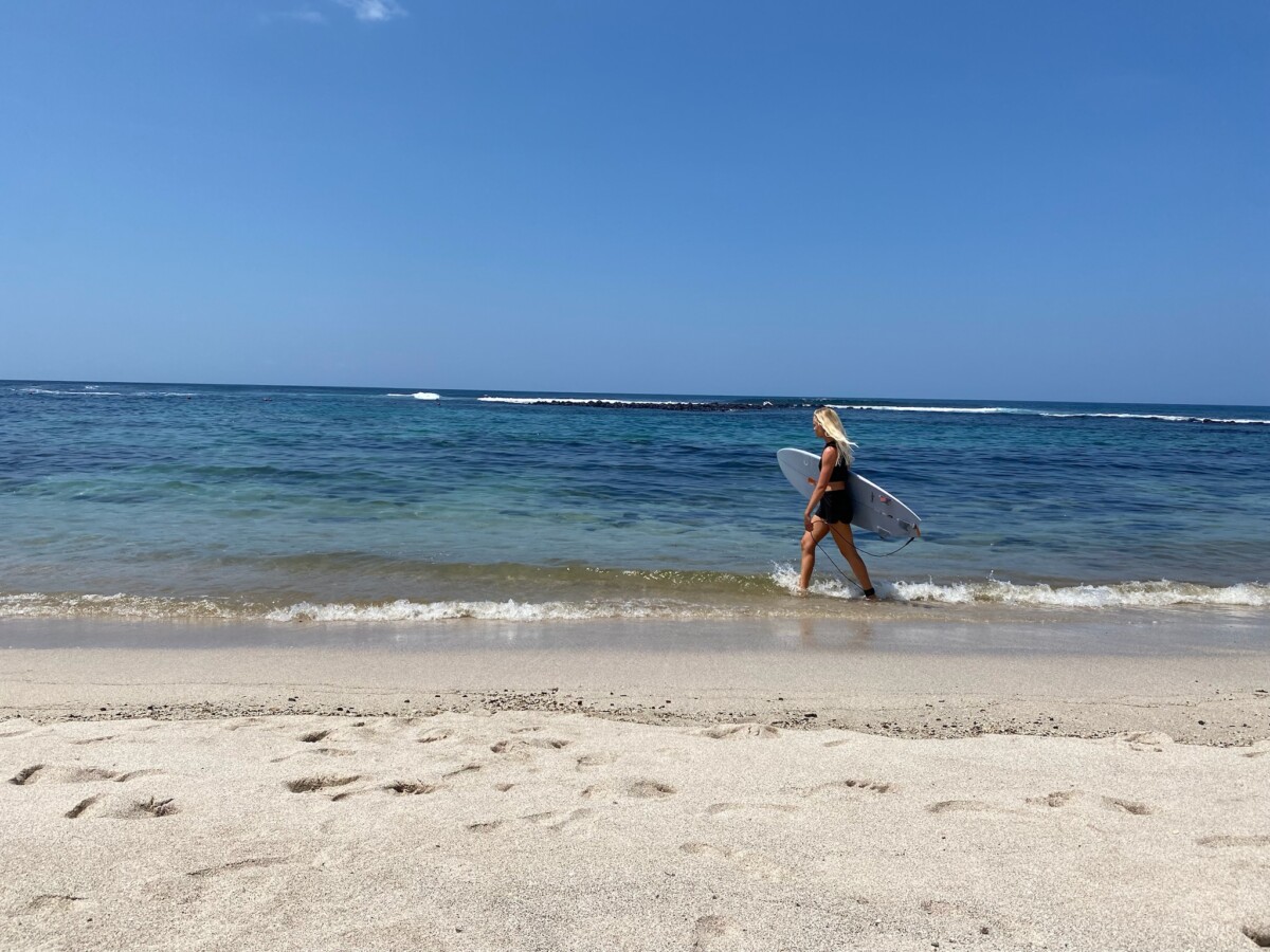 A surf girl at Playa Loberia