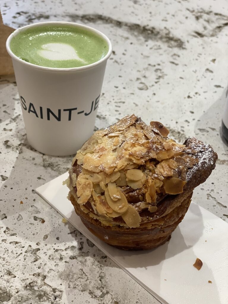 An almond pastry and a matcha latte at Saint Jean. The must-eat vegan pastry in the Jordaan