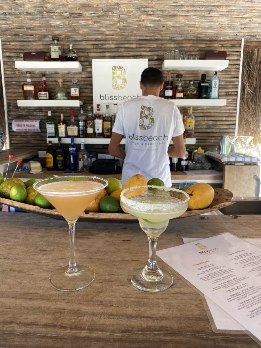 A French Kiss and a Margarita cocktail on the bar, Tristan in the background