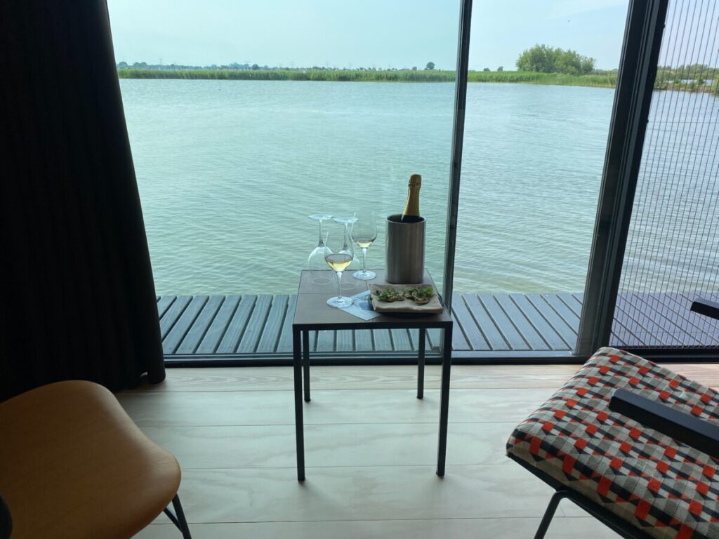 A view of the water from our room on Vuurtoreneiland, with our wine and snacks on the table